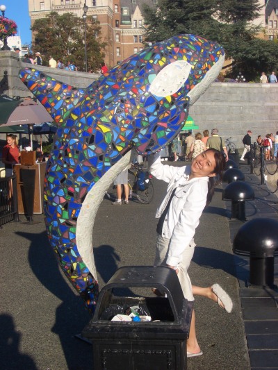 with the colorful orca sculpture at the waterfront walk